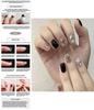 Short Fake Nail Decals With Black Sparkling Water Diamoans And Star Motifs For Cute And Trendy Nail Looks