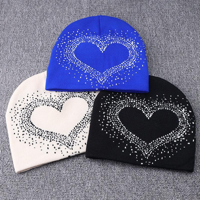 New autumn/winter fashionable knit hats, cold-resistant heart-warming knit hats, European and American pullover letters jacquard beanie