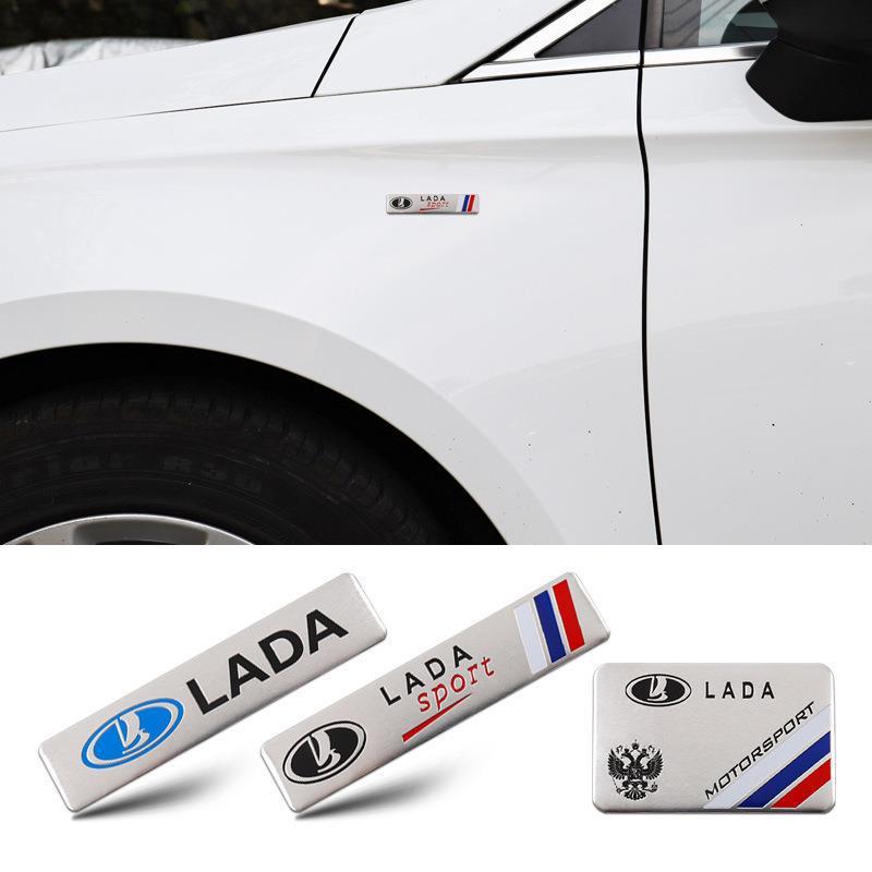 Автомобильные наклейки и алюминиевые шильдики LADA для декора