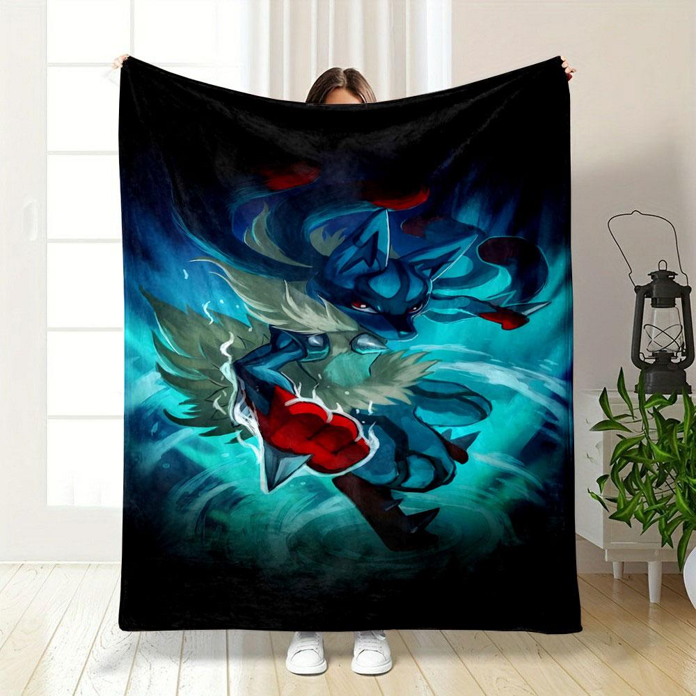 A dynamic blue creature with red accents surrounded by glowing energy. for all seasons blanket lunch break throw gift