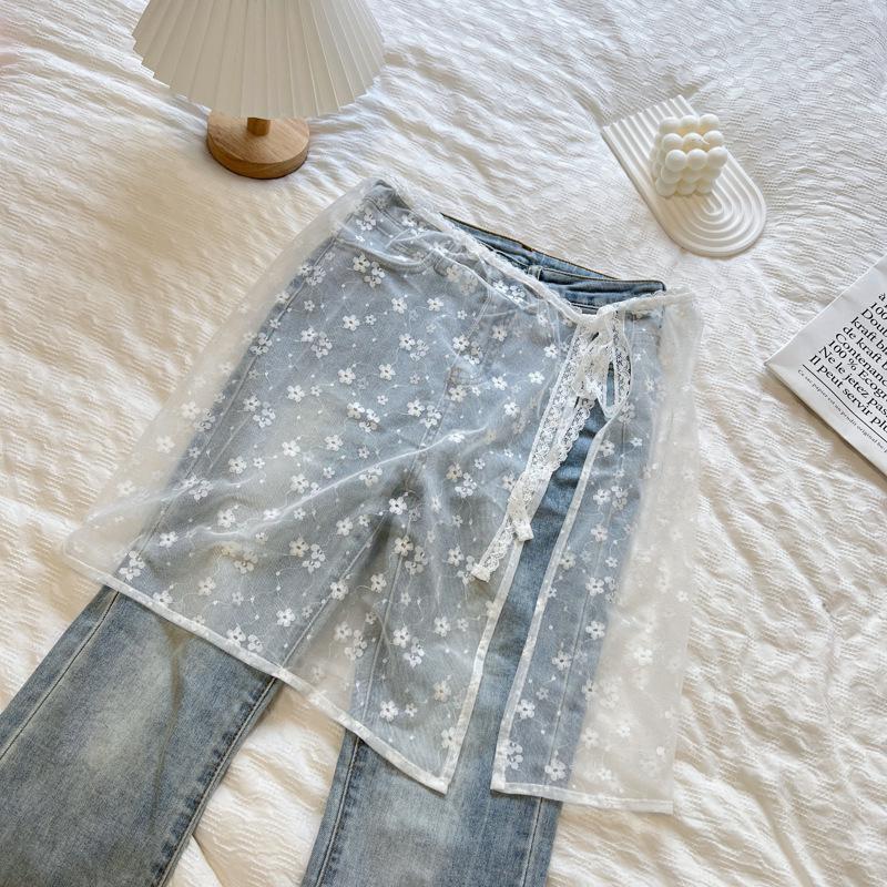 Корейская юбка из кружевного тюля с оборкой-фартуком и завязками