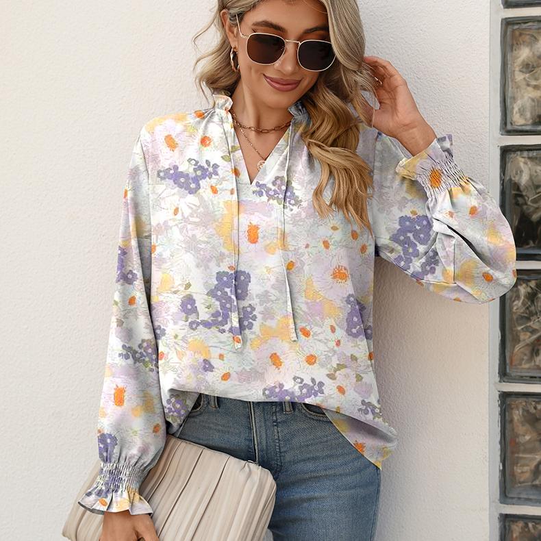 Женская тонкая непрозрачная блузка с цветочным принтом и рюшами на шнуровке