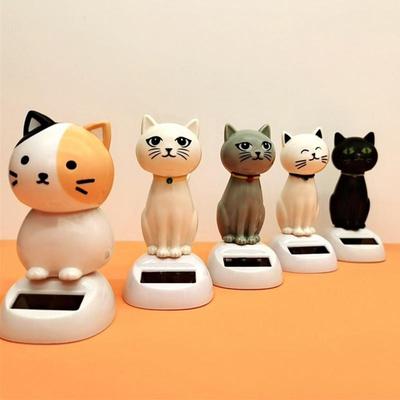 Украшение для автомобиля Солнечная мультяшная кошка игрушка Украшения на приборную панель Качающаяся кошка Автомобильные украшения Маленький гаджет Декор Аксессуары для интерьера автомобиля