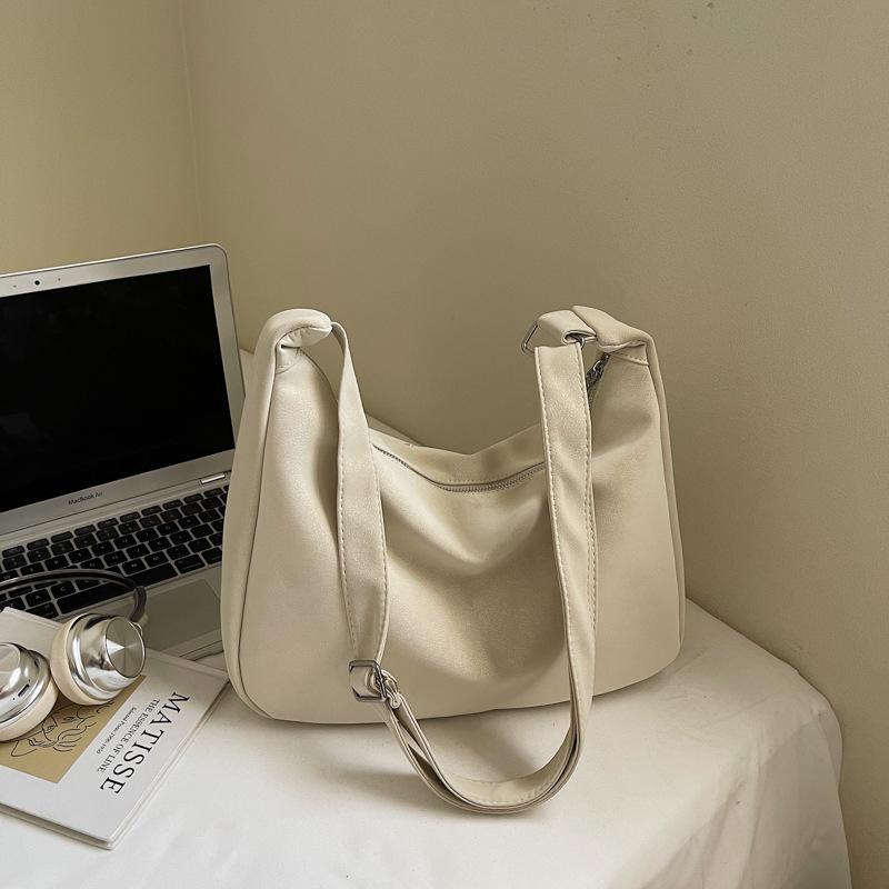 Сумка большой вместимости женская летняя новая модная нишевая на плечо кроссбоди текстурная сумка-пельмень для поездок на работу