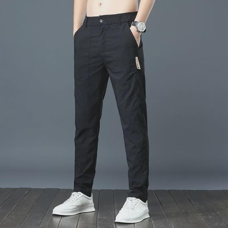 Men's Summer Ice Silk Casual Pants - Slim Korean Style, Loose, and Straight Trousers.