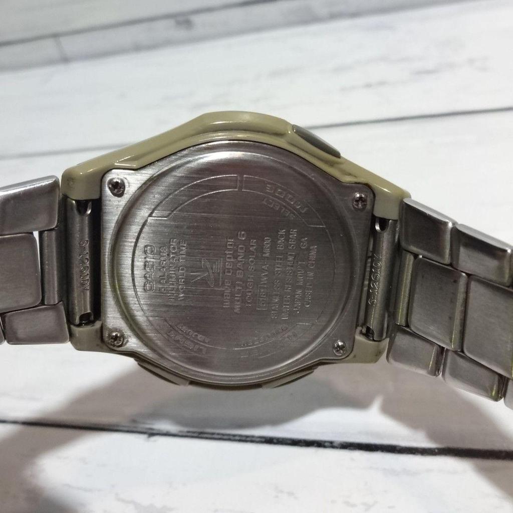 Б/у Полностью металлические солнечные радиочасы WAVE CEPTOR WVA-M600, рабочие, хорошее состояние