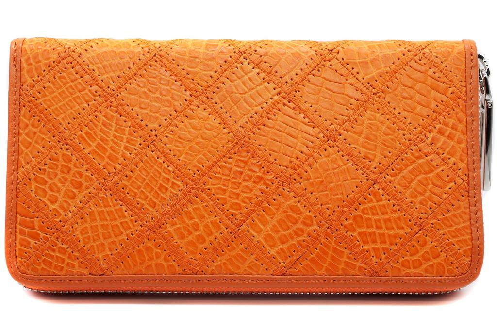 Оранжевый длинный кошелек для мужчин и женщин, изготовленный из цельного куска натуральной кожи крокодила. Имеет золотую круглую застежку-молнию, кошелек для монет, большой