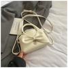 Gentle and stylish simple bow handbag 2025 summer new solid color Korean version casual niche messenger bag