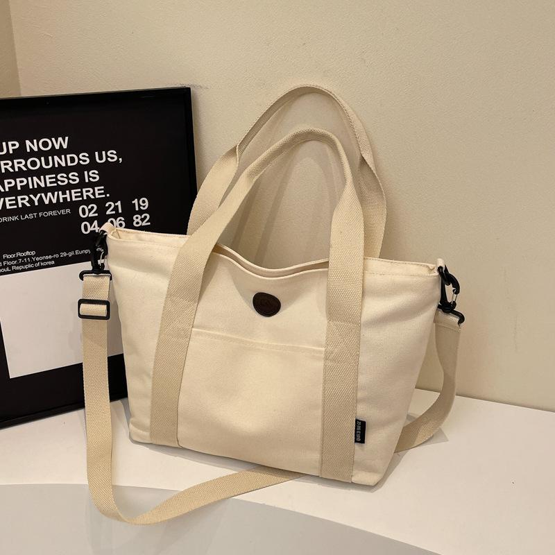 Большая вместительная тисненая сумка-тоут с буквами 2025 новая корейская версия маминой сумочки универсальная однотонная сумка через плечо модная