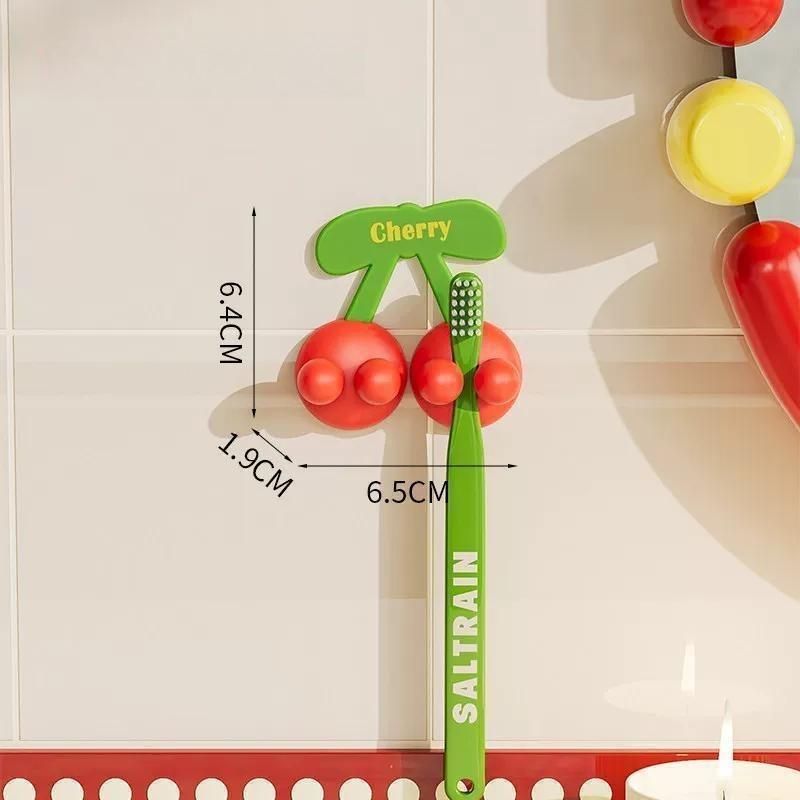 1PC Fruit-themed toothbrush holder for home bathrooms: wall-mounted, adhesive organizer rack for electric toothbrushes and dental care items.