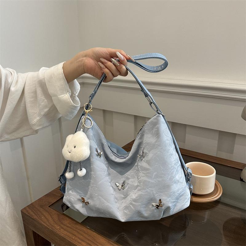 Мягкая кожа бабочка большая вместимость высокая ценность нежная наплечная сумка 2025 лето новая женская наплечная сумка-мессенджер тоут