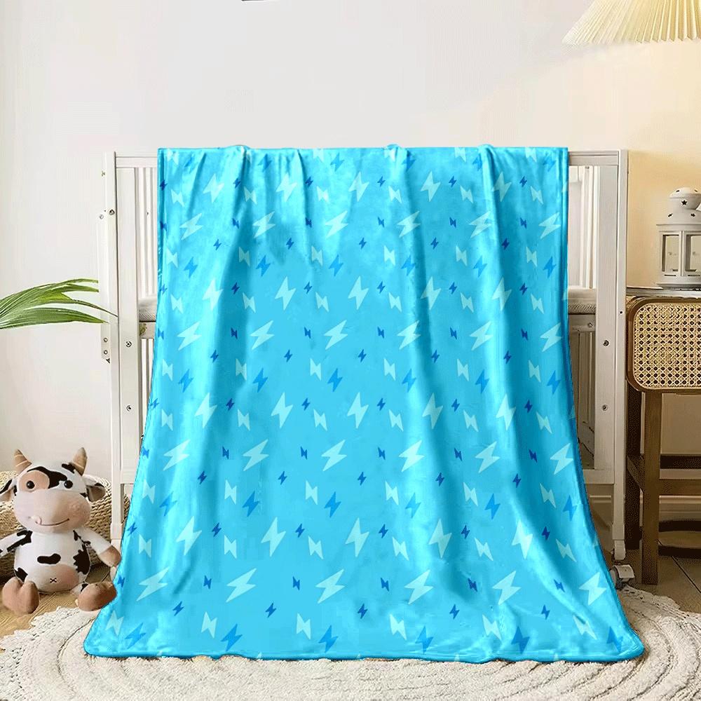 The pattern consists of scattered lightning bolt shapes in varying blue tones. for all seasons blanket lunch break throw gift