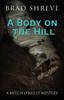 Книга A Body On The Hill 2 A Mitch Oreilly Mystery by Brad Shreve - Paperback