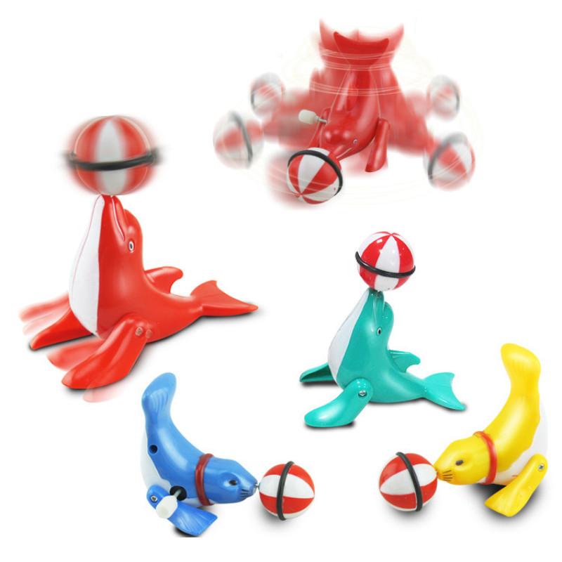 Mechanical Dolphin Rotating Toy With Chain Link Top Ball For Kids Learning And Interactive Play
