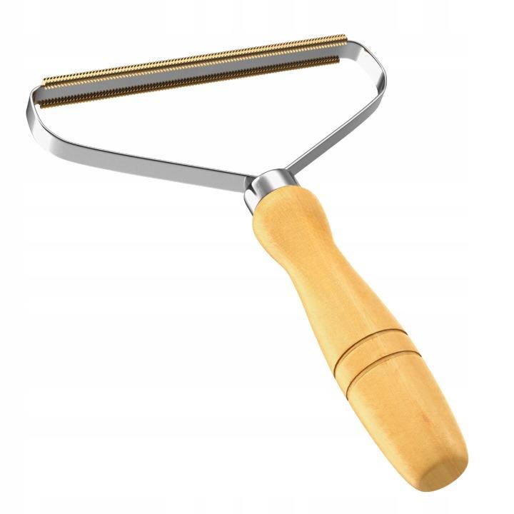 Effective brush comb FOR collecting hair and fluff from furniture and carpets
