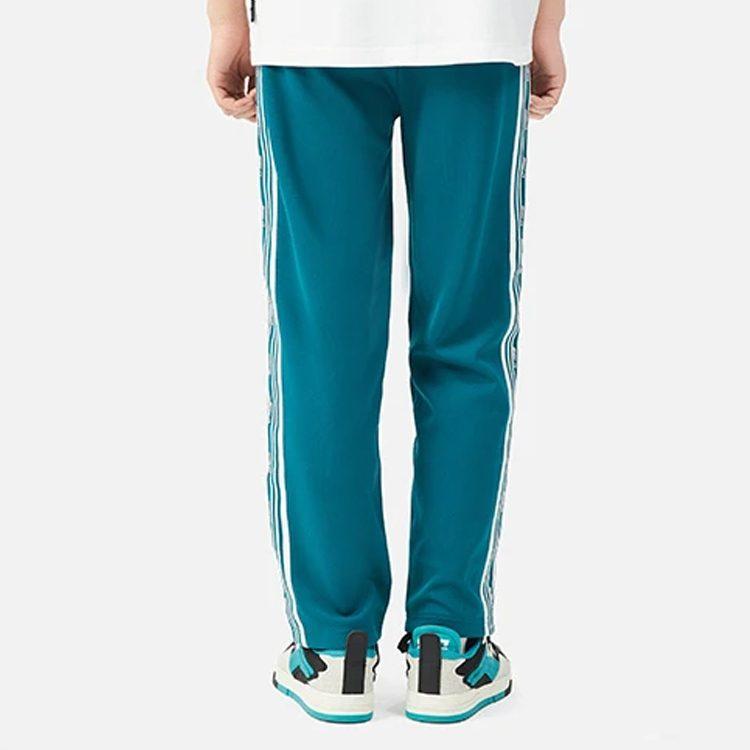 Li Ning Трикотажные спортивные штаны унисекс темно-еловый зеленый AKLS869-4