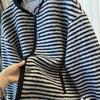 Пальто из шерсти ягненка большого размера: Стильный, Теплый и Стройнящий для Молодых Мам и Пожилых