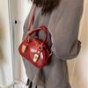 Корейская портативная сумка для боулинга женская 2025 новая нишевая ретро сумка-ракушка высококлассная универсальная сумка-мессенджер