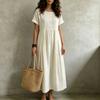 European and American cotton and linen dress women's summer new short-sleeved medium and long pleated loose casual solid color long dress