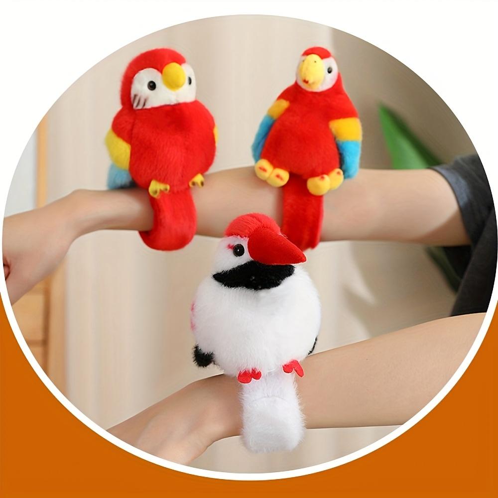 Cute parrot plush wristband with snap closure. Colorful bird-shaped wearable toy for kids, lovely collectible accessory.