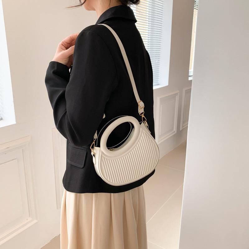 Fashionable Mid-size Round Shoulder Bag For Women In Street Style With Stylish Stitching