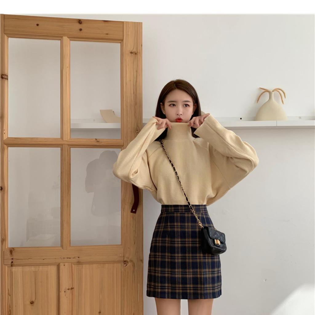 Юбка А-силуэта с высокой талией в клетку для женщин — тренд осени/зимы 2023 года