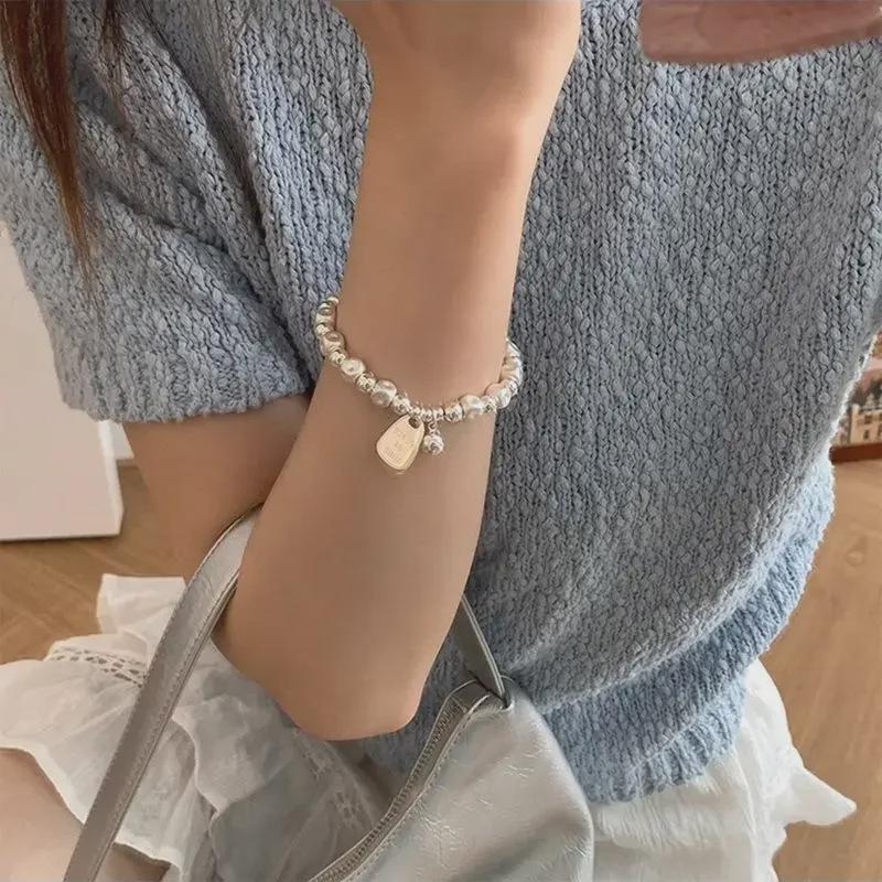 Elegant Niche Silver Bracelet with Concave Square Beads - High-End Luxurious Design