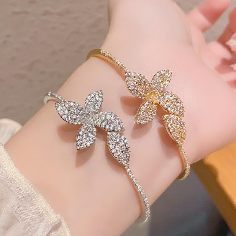 Niche four-leaf flower butterfly open zircon bracelet bracelet versatile hand jewelry women