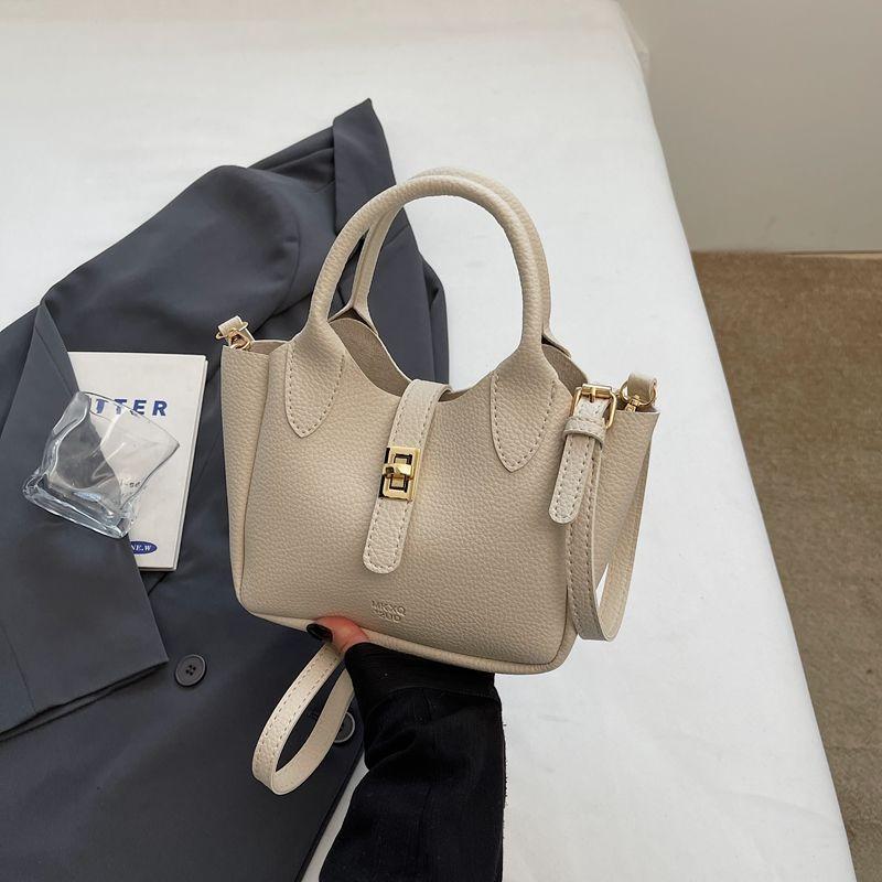 Xia Xiao Свежая Универсальная Сумка Женская Новая Повседневная Сумка-Ведро Для Поездок На Работу Наплечная Сумка-Почтальон