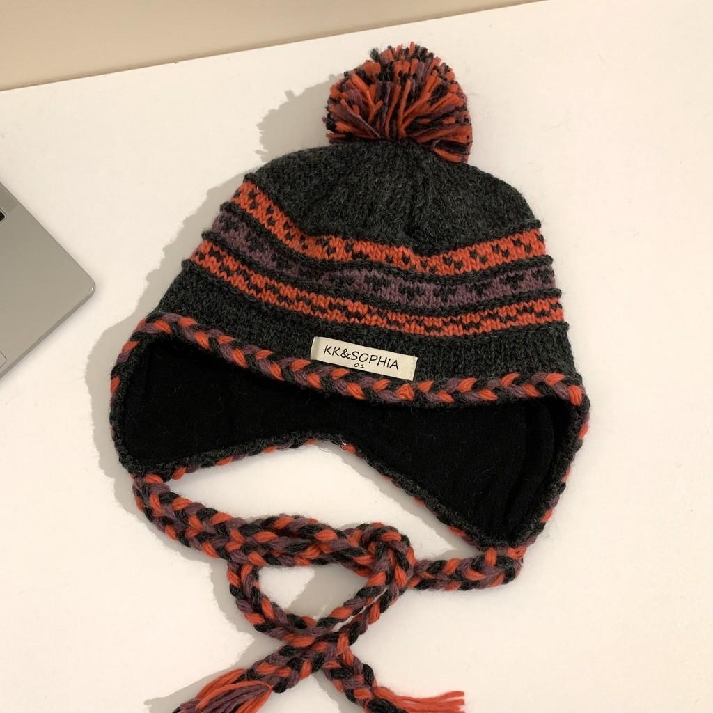 Knitted Chic Cozy Winter Hat For Women Featuring Colorful Pom Poms Warmth And