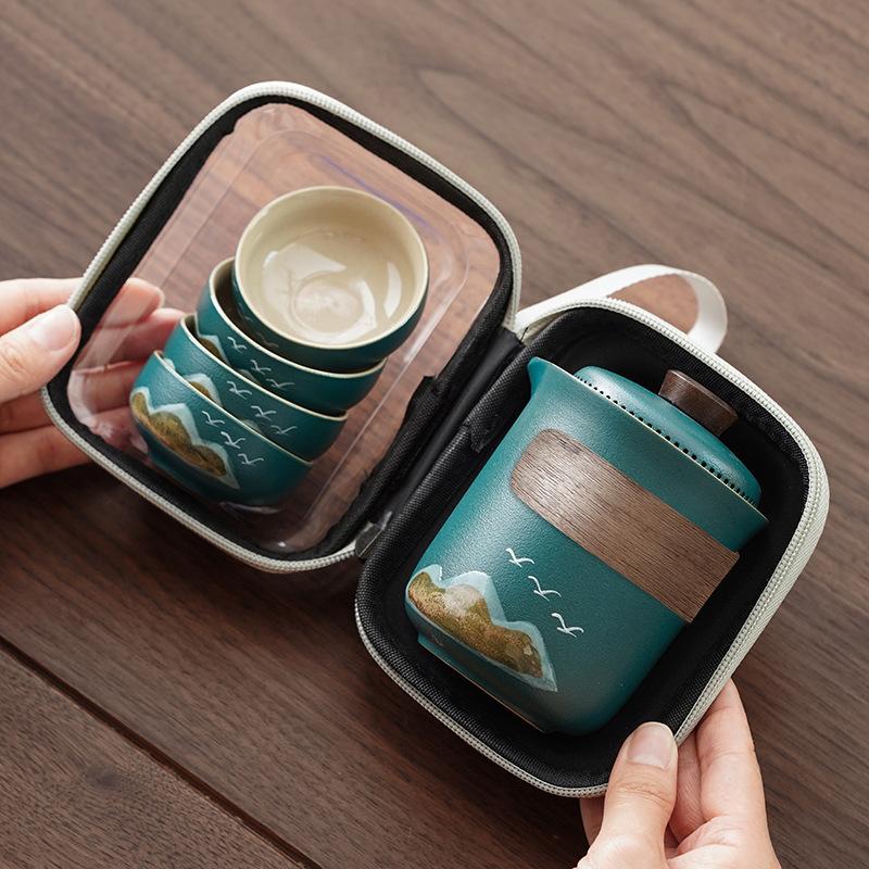 Kung Fu tea set travel set outdoor portable coarse pottery business express guest making tea, a pot of four cups of new Chinese gifts
