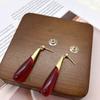 Серьги-капли красного цвета, модная индивидуальность, трендовый индивидуальный дизайн, серьги-гвоздики, серьги, украшения для ушей в стиле ретро.