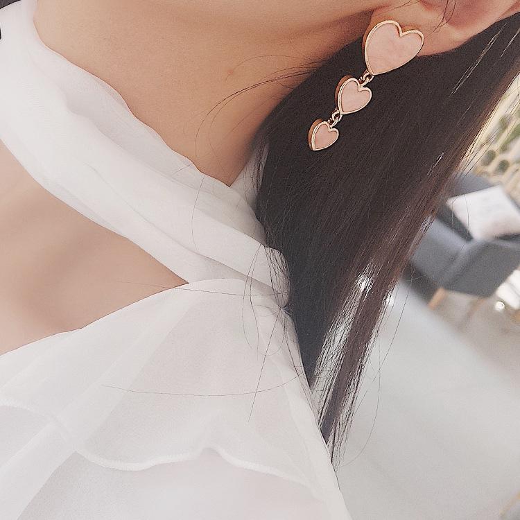 Женские длинные серьги в форме сердца