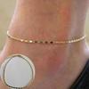Versatile Women Simple Gold Plated Chain Anklet Ideal For Beach And Casual Wear