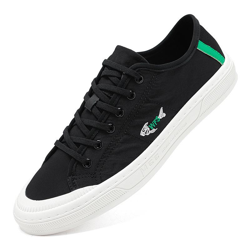 Four Seasons Men's White Canvas Shoes: Korean Style, Casual, Breathable, Lace-up, Low-top Fashion Sneakers.