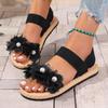 Модные женские летние сандалии на плоской подошве 2025 Модные черные с круглым открытым носком на резинке Обувь Цветочные Удобные женские пляжные сандалии