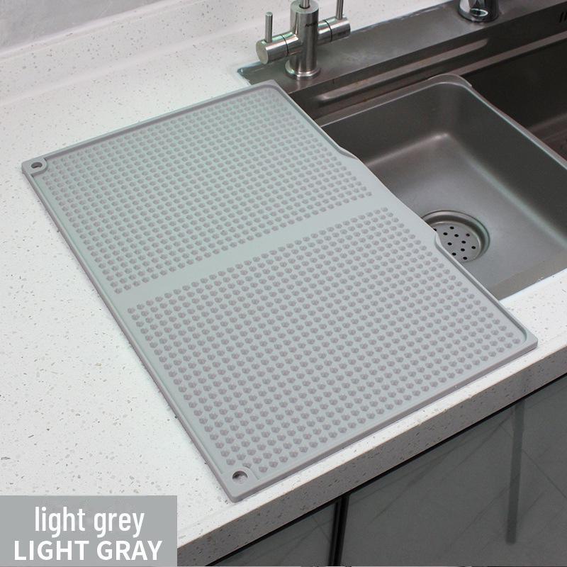 Non-Slip Silicone Kitchen Counter Mat: Drain, Insulation, Anti-Scald Coaster for Pots & Bowls.