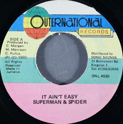 7-дюймовая пластинка SUPERMAN SPIDERMAN It Aint Easy ONL4530 Outernational R 1992 Ямайка Регги Ска Даб Б/у