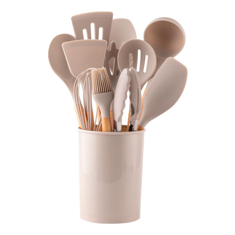 Factory wholesale creative kitchen tools 11-piece set silicone spatula with storage bucket wooden handle silicone kitchen utensils 12-piece set