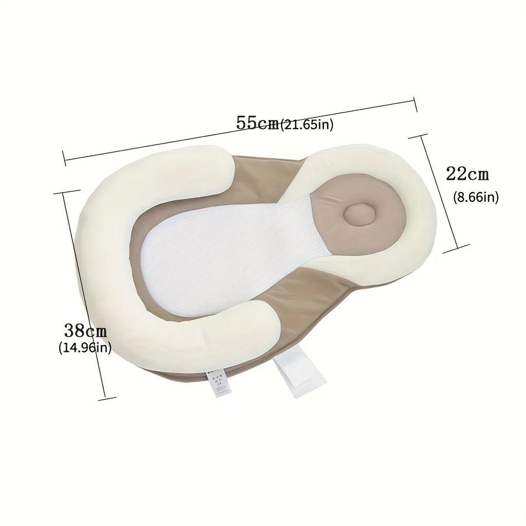 Переносная кроватка с поддержкой головы и тела для предотвращения переворачивания новорожденных.