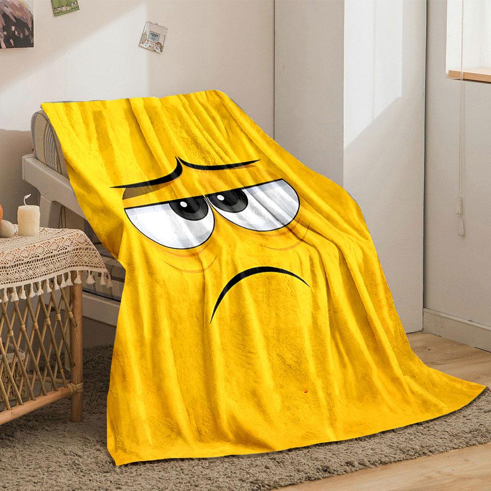 Yellow background with a sad cartoon face featuring droopy eyes and frown. for all seasons blanket lunch break throw gift