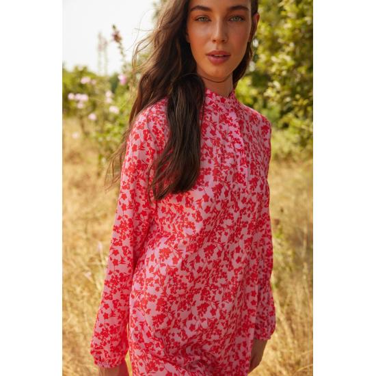 Оранжевая юбка с полуворотником с цветочным принтом и широкое платье с оборками