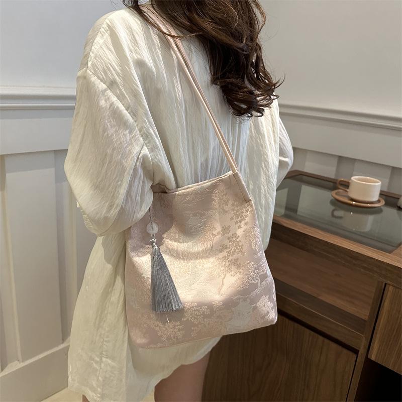 Новая китайская сумочка, новая красивая сумка через плечо для женщин, персонализированная повседневная женская ручная сумка-ведро с текстурой