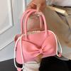 Gentle and stylish simple bow handbag 2025 summer new solid color Korean version casual niche messenger bag