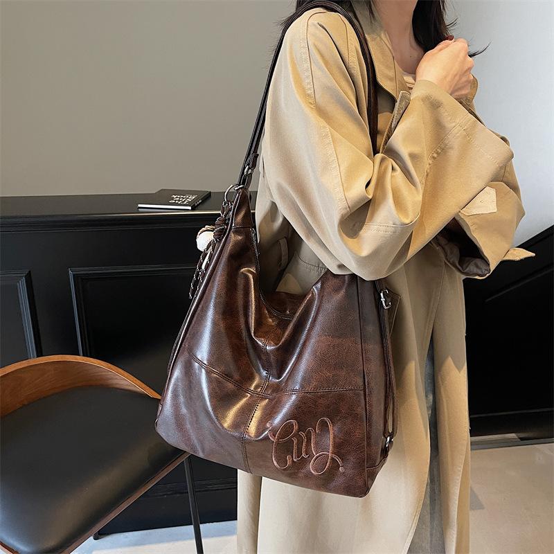 European and American Retro Tote Bag 2025 New Women's Shoulder Messenger Bag Backpack Fashionable and Simple Women's Bag
