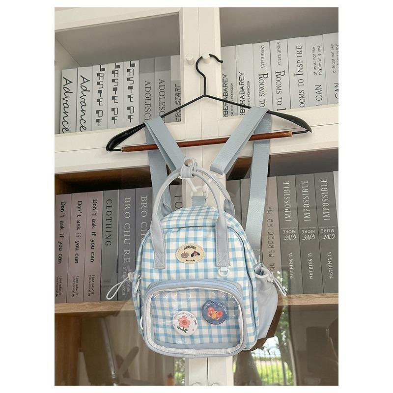 Новый школьный рюкзак - это высококачественный, свежий и милый клетчатый узор, ленивый и прозрачный, и мини-рюкзак для девочки.