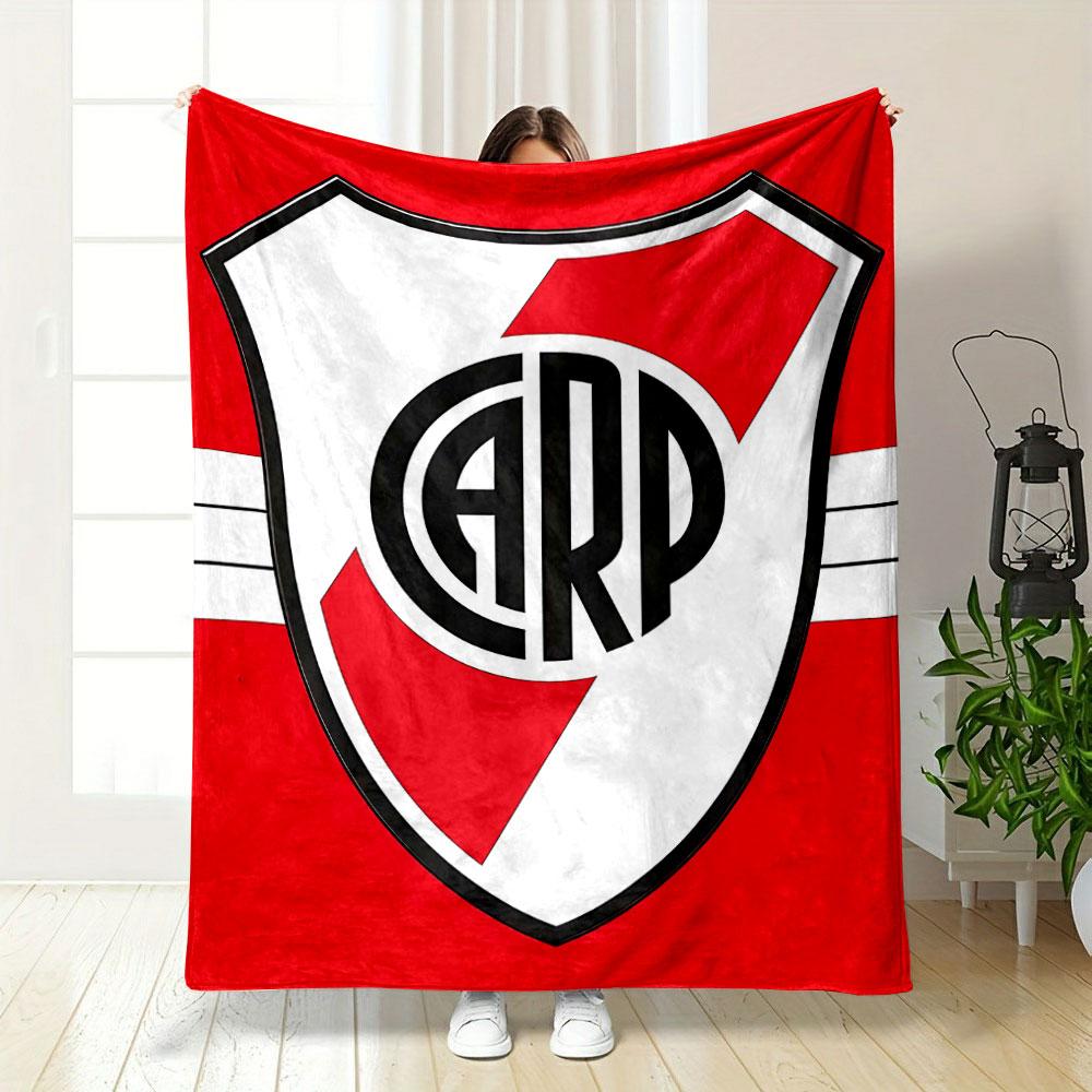 A shield with red diagonal stripes and bold "CARP" letters in the center. for all seasons blanket lunch break throw gift