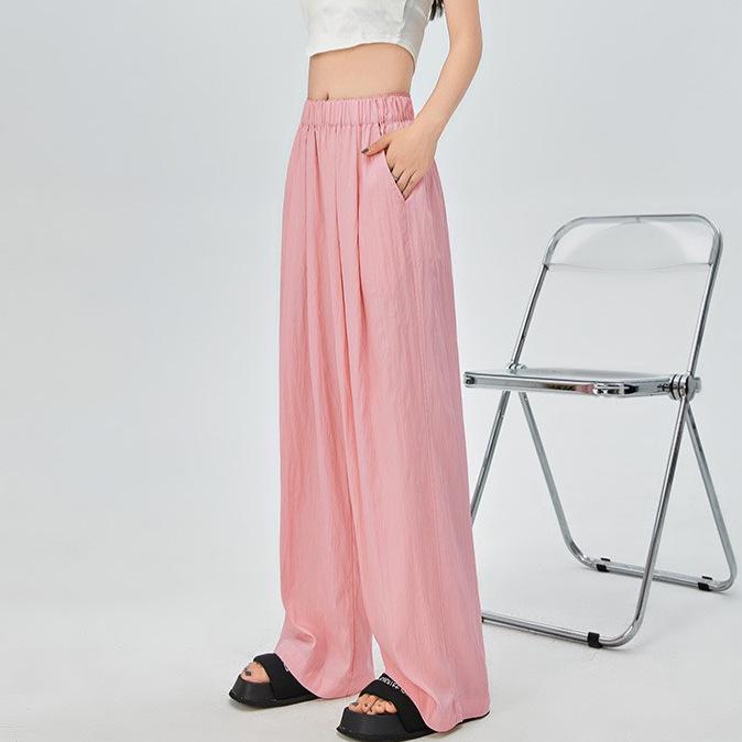 Женские весенние брюки из шёлка с высокой талией и складками — узкие, свободные, широкие с карманами