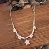 Bohemian vacation style egg flower necklace earrings set ins niche flower soft pottery color collarbone chain tide