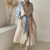 Women's Korean Chic Retro Trench Coat with French Lapel, Color-Contrast Stitching, and Lace Waist Trim.